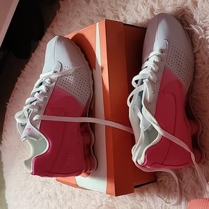 Pink and white nike shox